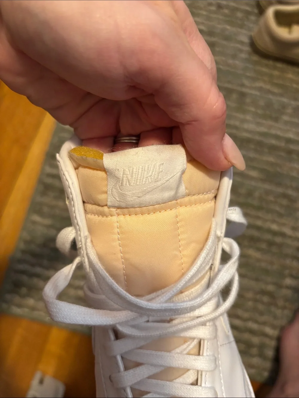 All White High-Top Nike Blazer Sneakers